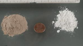 Picture of white and black heroin with penny