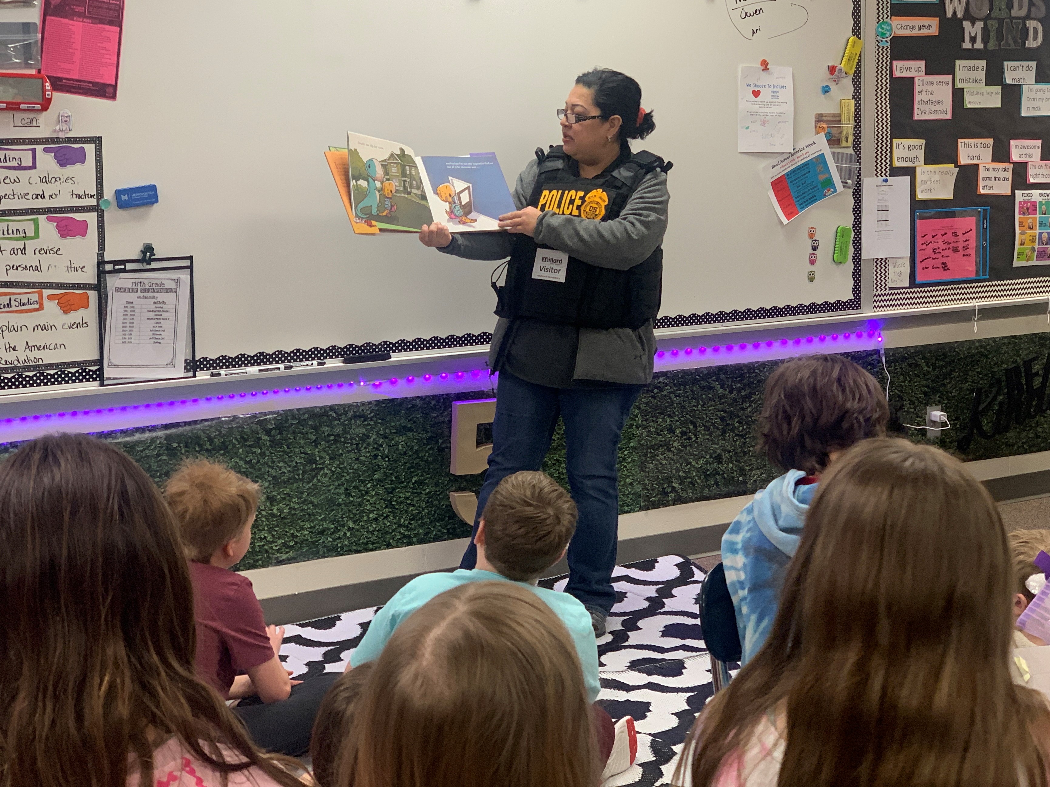 A member of DEA reads to students in Nebraska.