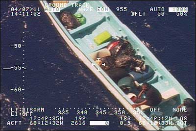 Aerial photo of drug smugglers’ boat with contraband on board taken by a U.S. Customs and Border Protection Caribbean Air and Marine Branch Dash-8 aircraft. 