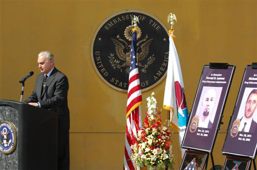 "Ambassador Francis J. Ricciardone addresses the crowd at a ceremony to honor 3 fallen DEA agents killed in Afghanistan Oct 26, 2009." Photographer: Daniel Wilkinson  