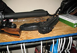 photo - Assault Rifle and two handguns seized during search warrant