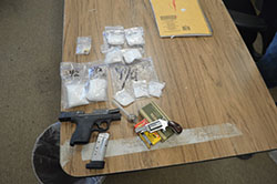 Methamphetamine and two handguns seized from Jesus Valenzuela.