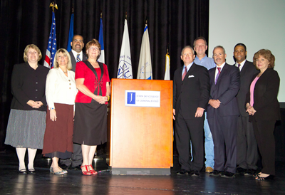 Front row from left: Moira Gibbons, Lisa Robin, Linda Surks, SAC John Gilbride, Chief Matthew Murphy, Dr. Roberta Blotner. Back Row from left: DI Luis Carrion, Honorable Scott Burns and AUSA Ray Lohier