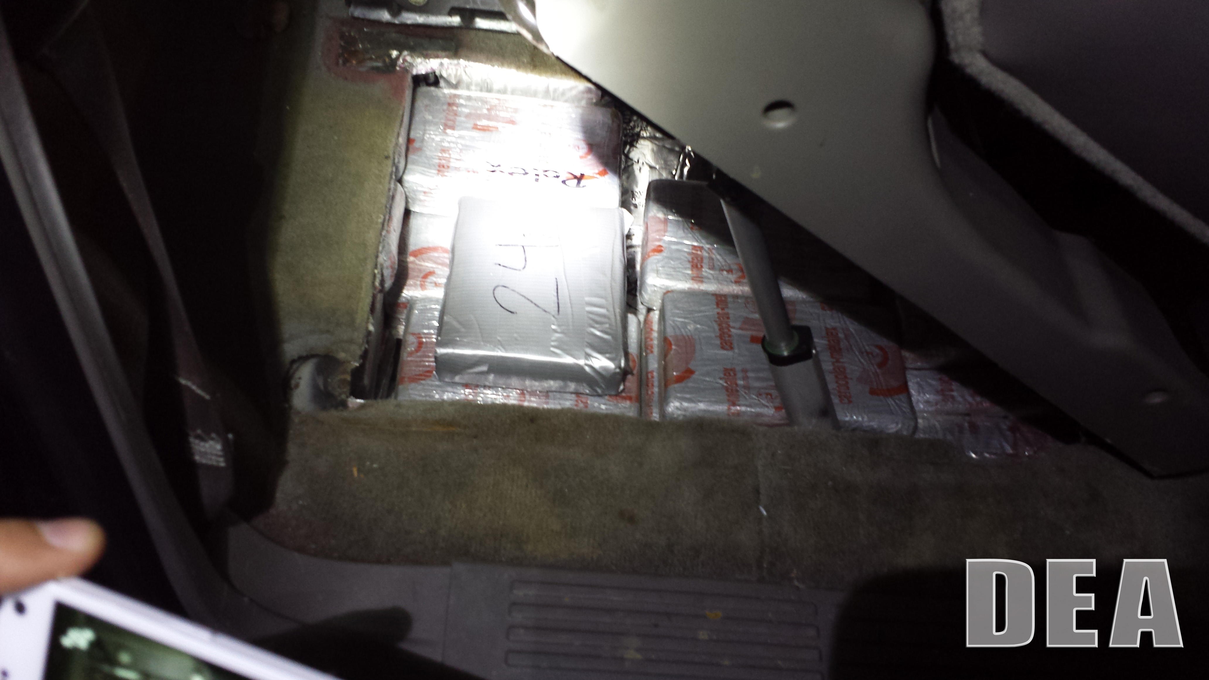 O70 kilograms of heroin hidden in a concealed compartment