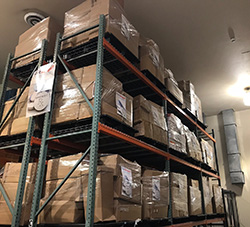 DEA’s evidence warehouse filled to the ceiling with boxes from the 14th Take Back Event. 