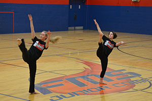 Dance Team members perform some modern dance moves for the audience.