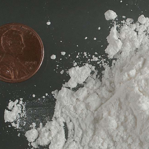 Cocaine powder vs penny