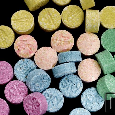 Ecstasy tablets in rainbow colors