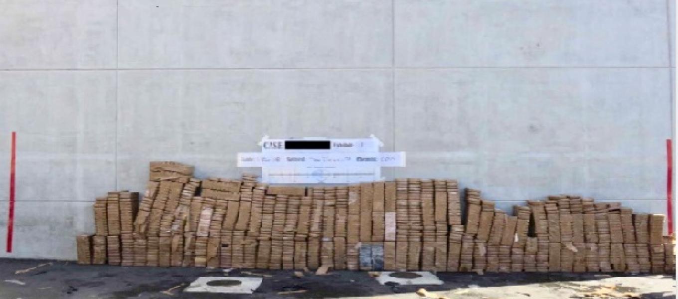 Complete bundles of cocaine seized during arrest of defendants.