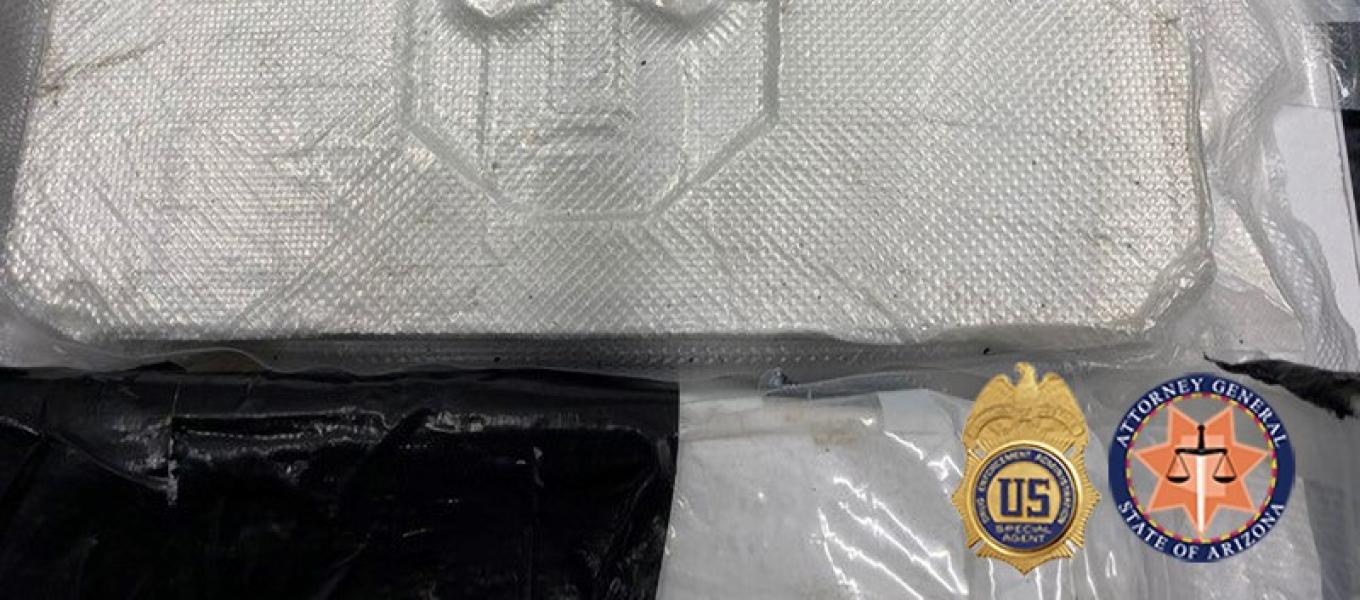 Photo of One Kilogram of Fentanyl Powder Stamped with Transformer Logo.