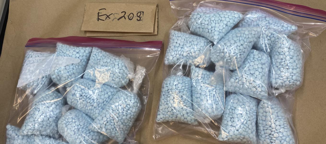 Seized fentanyl pills in baggies 