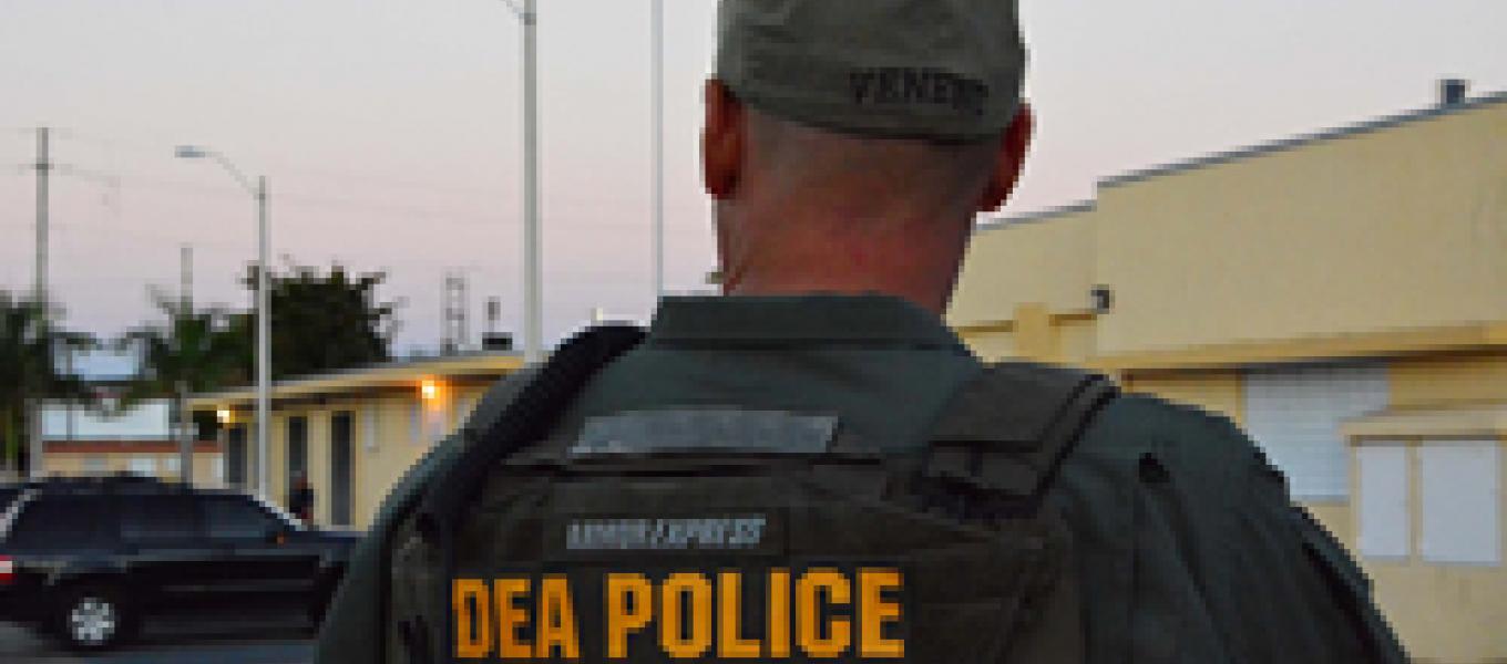 DEA Special Agent provides perimeter security during arrest operation at La Ceiba Public Housing Project in Ponce, Puerto Rico