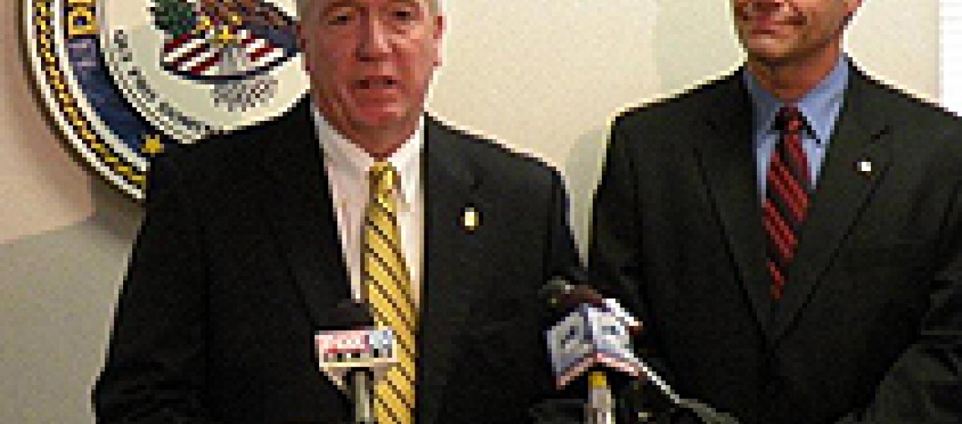 DEA Special Agent in Charge Jack Riley (at podium) and Wisconsin Attorney General J.B. Van Hollen address the media.