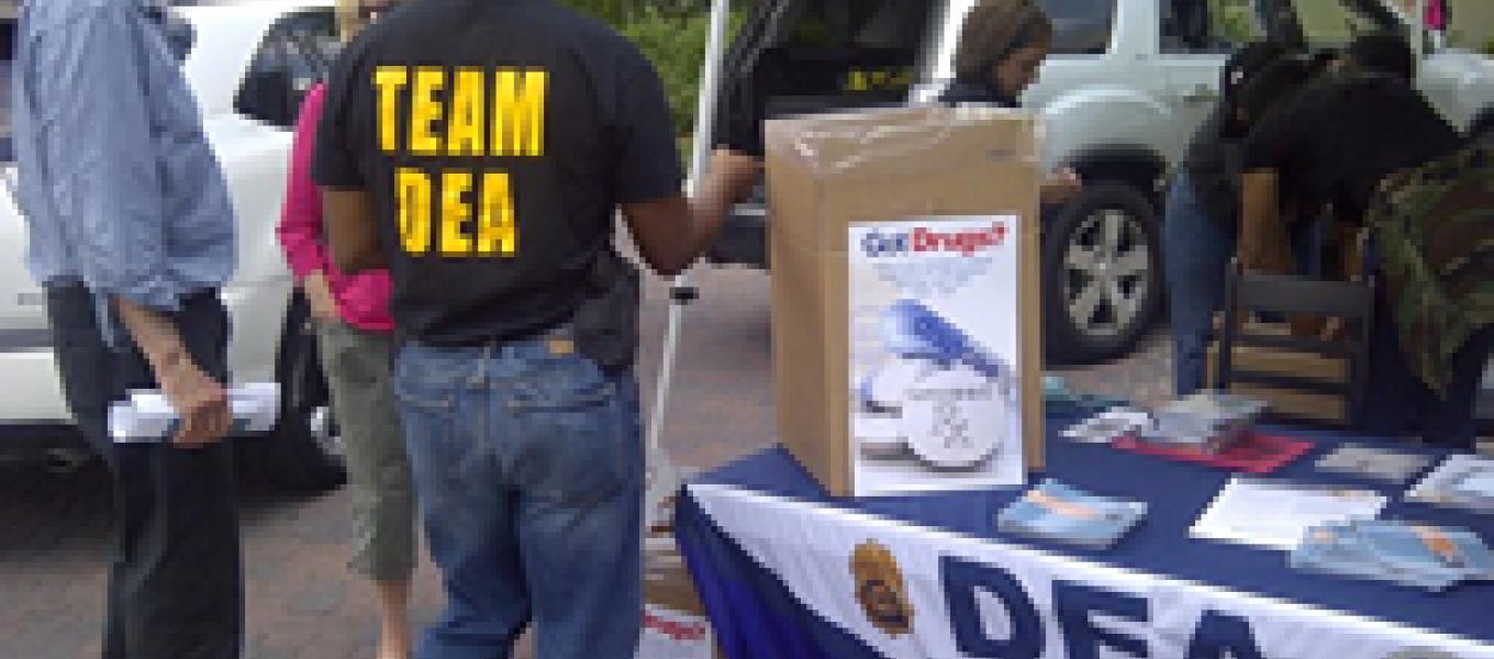 DEA employees in New Orleans, LA taking back drugs on a previous prescription drug take-back day.