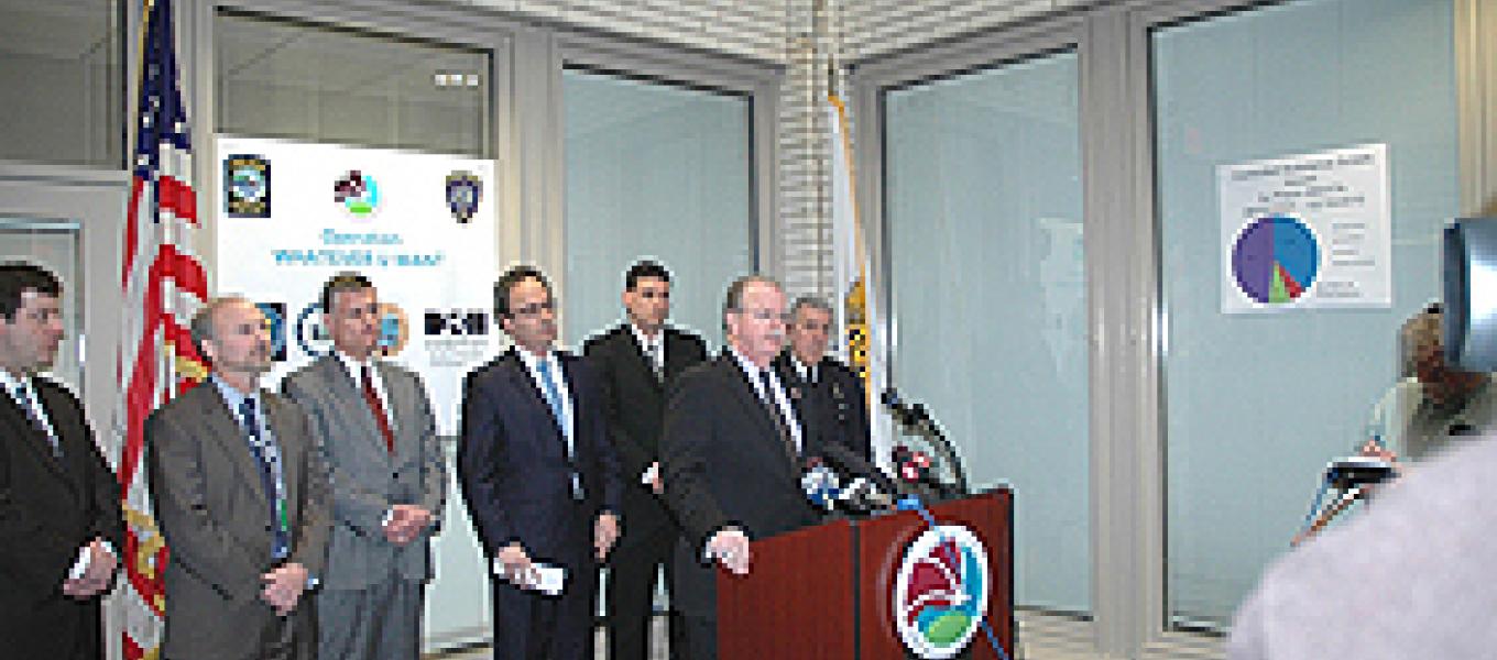 ASAC James R. Burns Jr. at the podium. L-R (background): RAC Dale Kasprzyk, Gary Baldauf Regional Director Medicaid Fraud, U.S. Attorney William J. Hochul, Jr., Niagara County Sherriff James R. Votour, Niagara Falls Chief of Police John R. Chella.