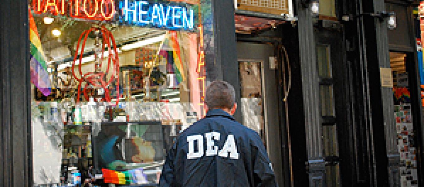 DEA Agent outside one of the shops allegedly selling “bath salts.”