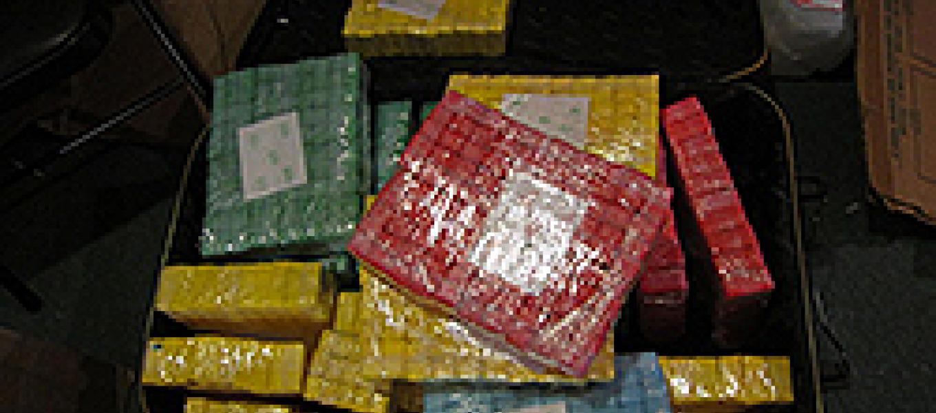 Bundled heroin glassines color sorted for delivery.