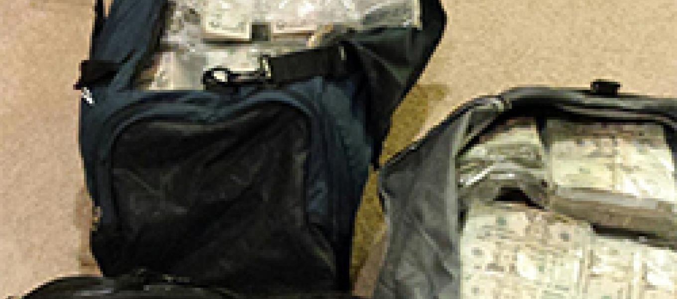 DEA Baltimore recovered three large duffel bags in the basement of E. Hernandez-Barba’s home, the bags were found to contain $2.4 million.